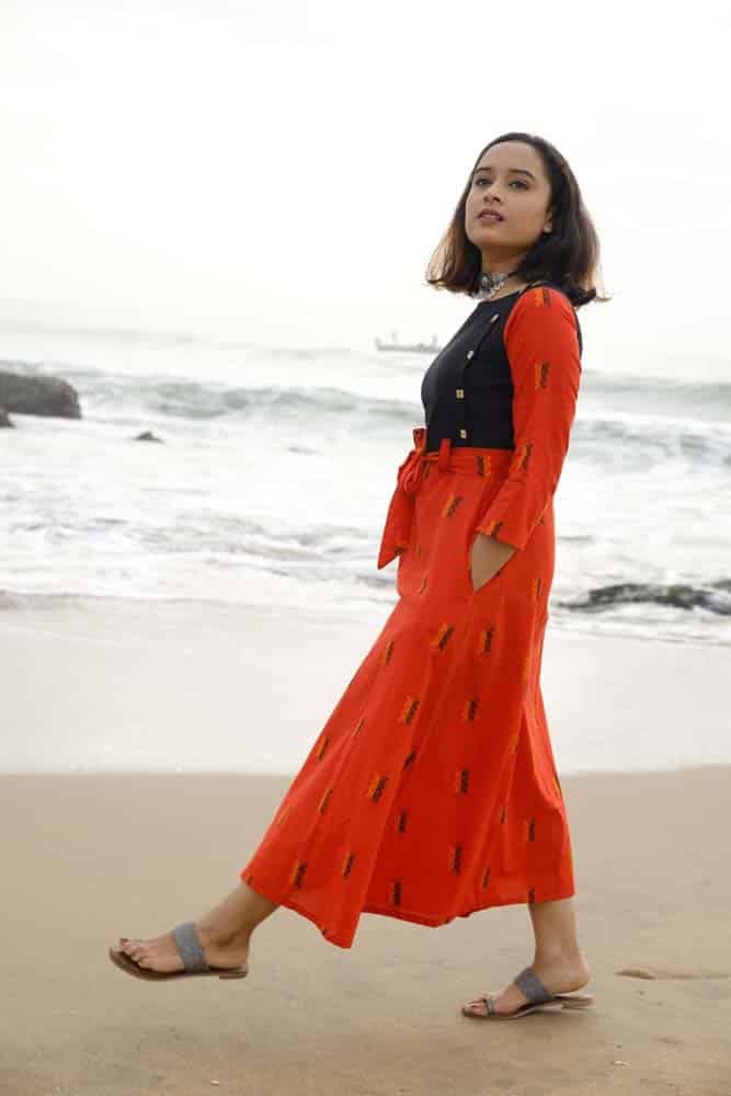 Dress 17 - Handloom cotton with thread motifs dress along with belt in fanta orange