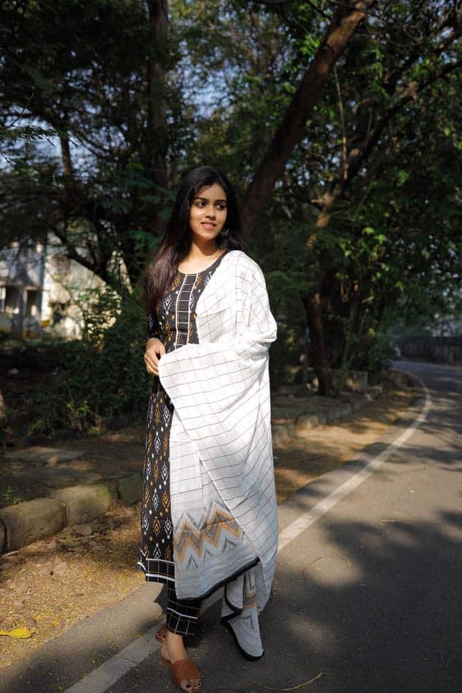 Black Hand 鈥� loom Cotton Ikkat Suit Set- Handloom Ikkat top with Handloom striped cotton pants with matching dupatta