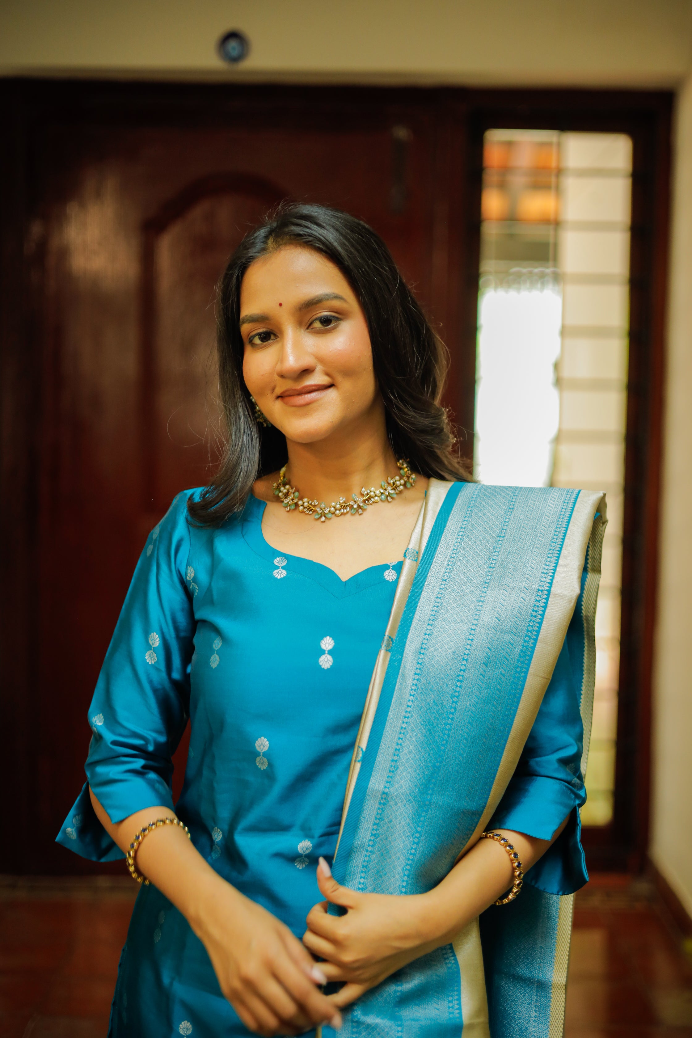 Ilavarasi (blue) - silver zari vegan silk suit set in blue and green