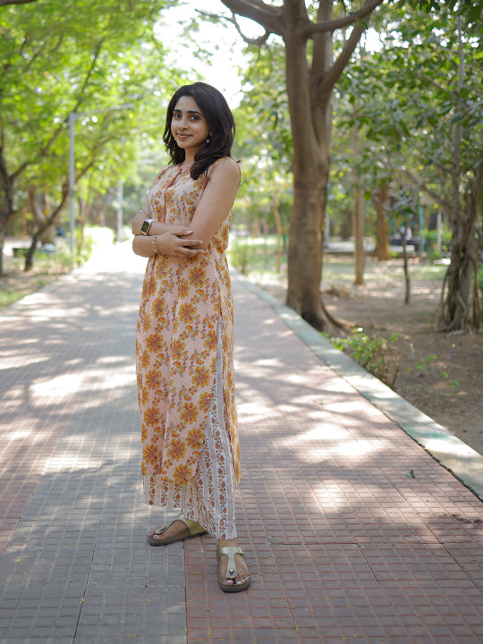 Rudrakshi - floral handblock printed cotton kurta set in orange & yellow