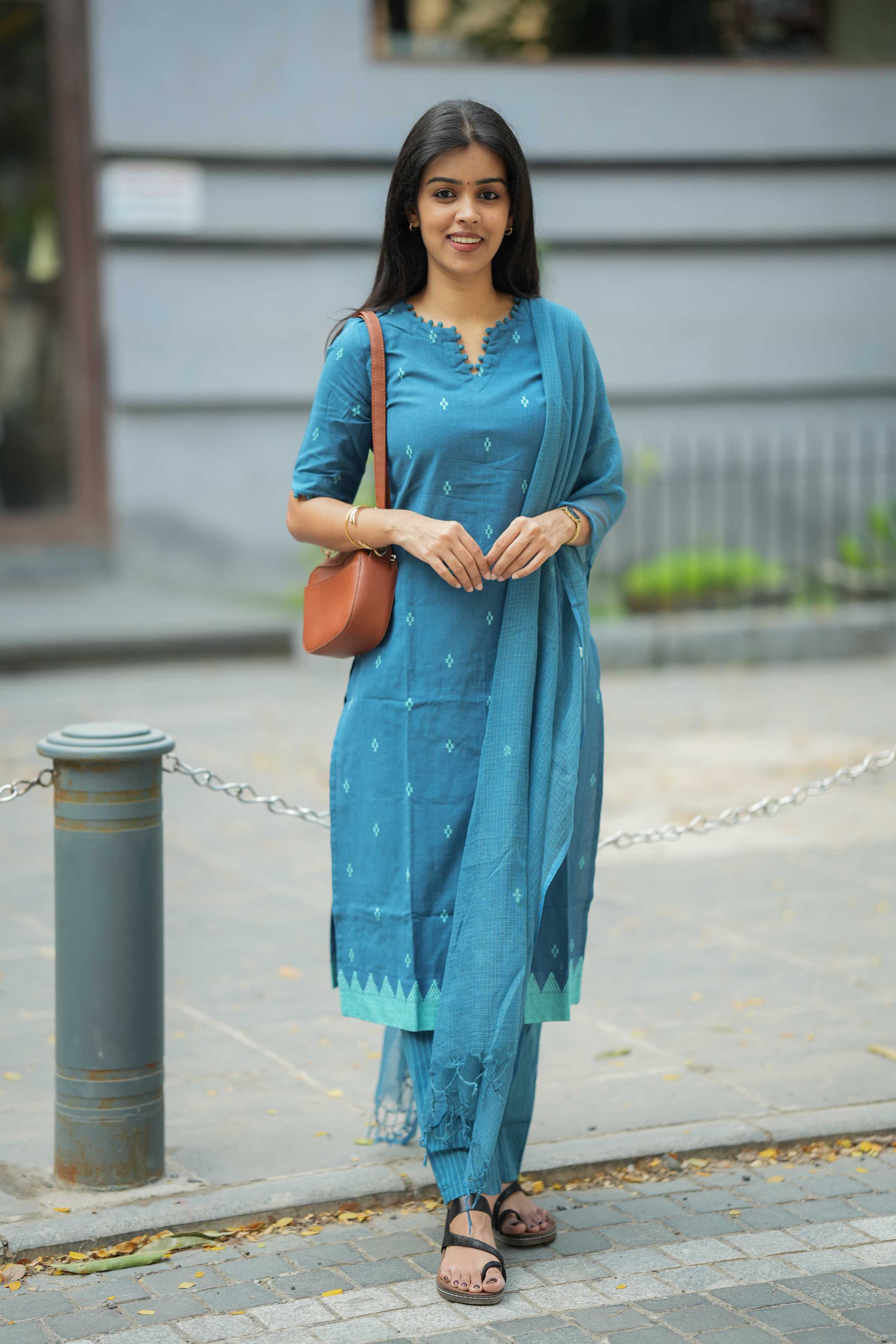 Tarini - handloom cotton suit set with temple borders in blue colour