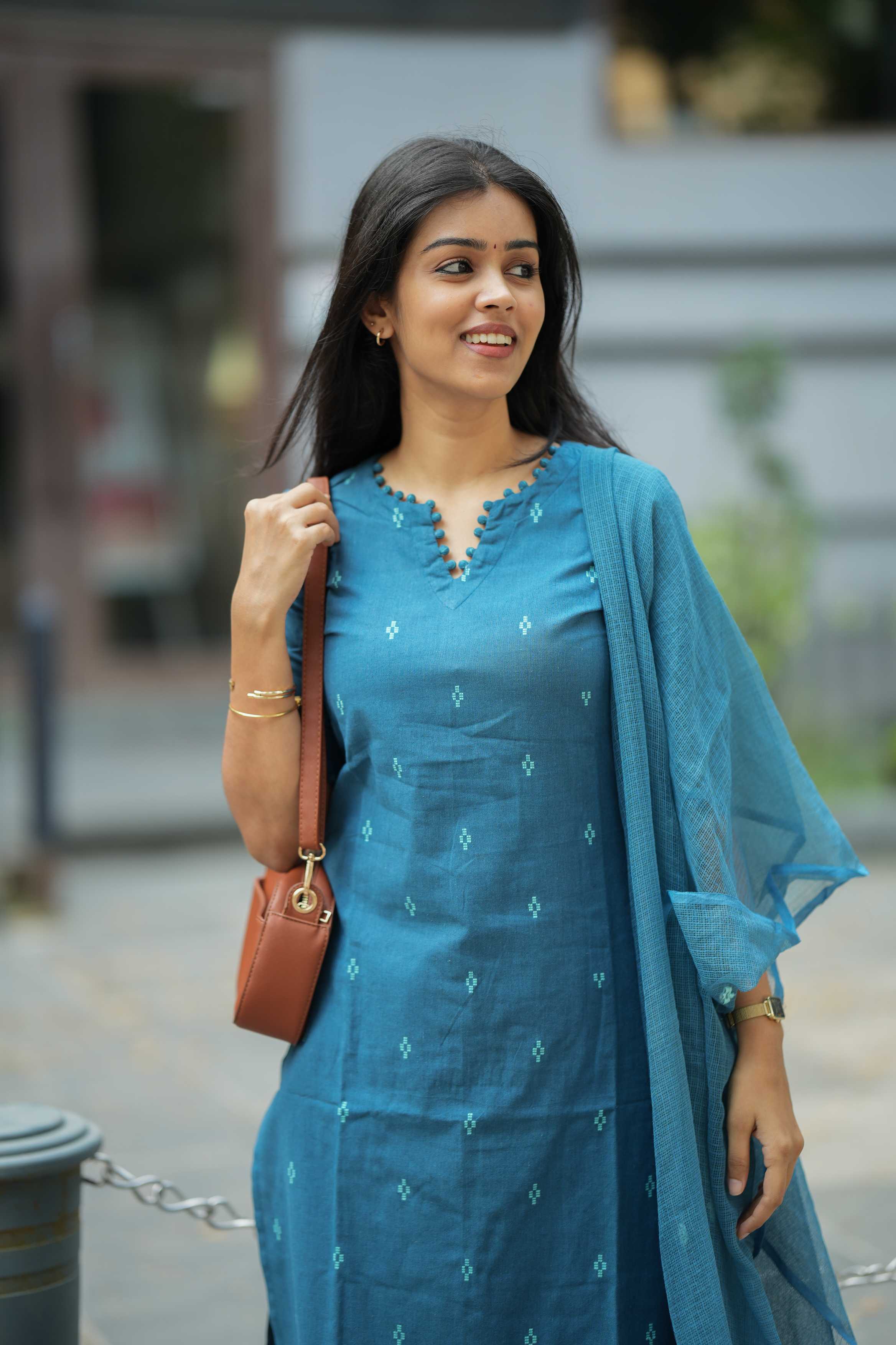 Tarini - handloom cotton suit set with temple borders in blue colour