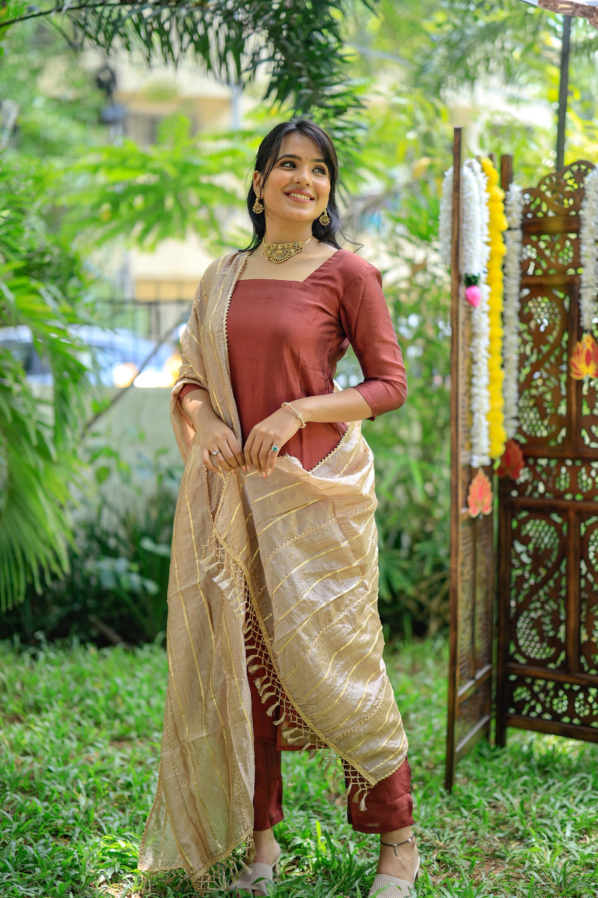 Tapsee ( rust red ) - anokha silk suit set with gota heavy silk dupatta in rust red and cream colour