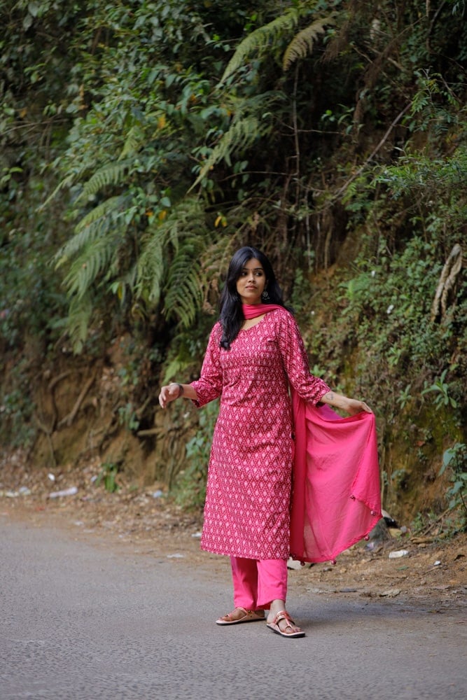 Nardana pink -  ikkat cotton suit set in pink with kota doria dupatta with Ikkat potli tassels