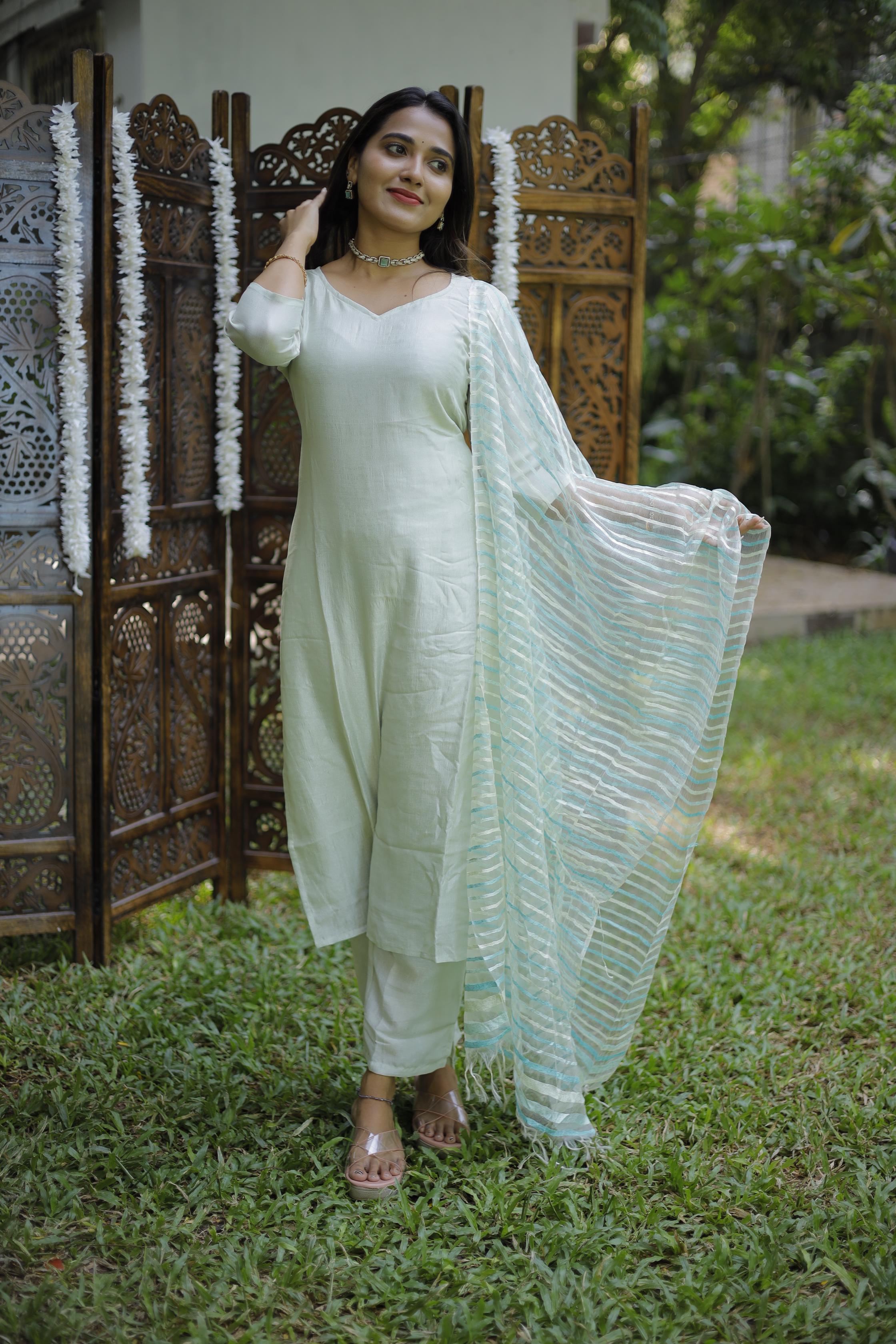 Hira ( mint green ) - Crepe silk suit set with a fancy striped dupatta