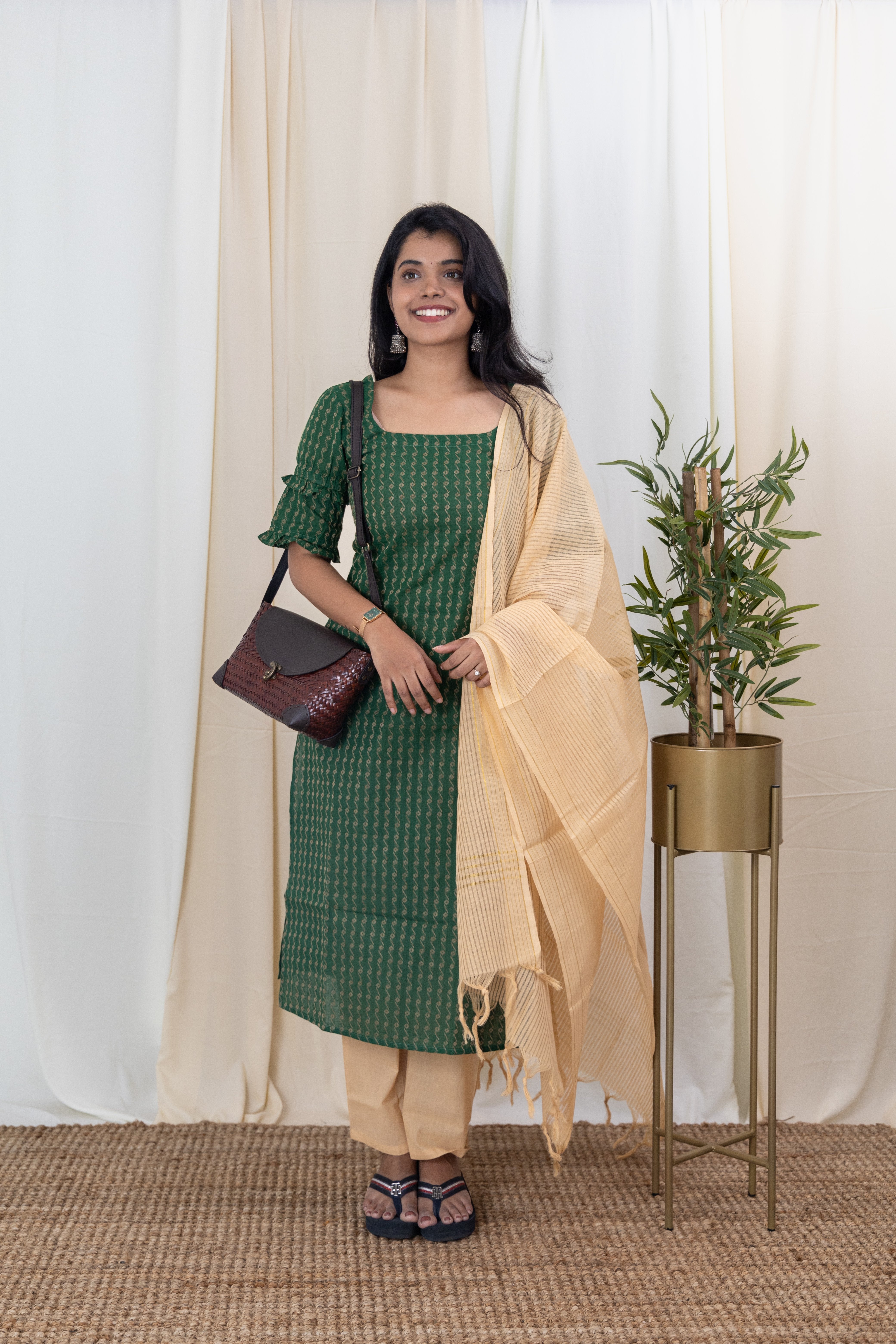 Yaazhini - Handloom cotton suit set with kota zari dupatta in dark green and cream