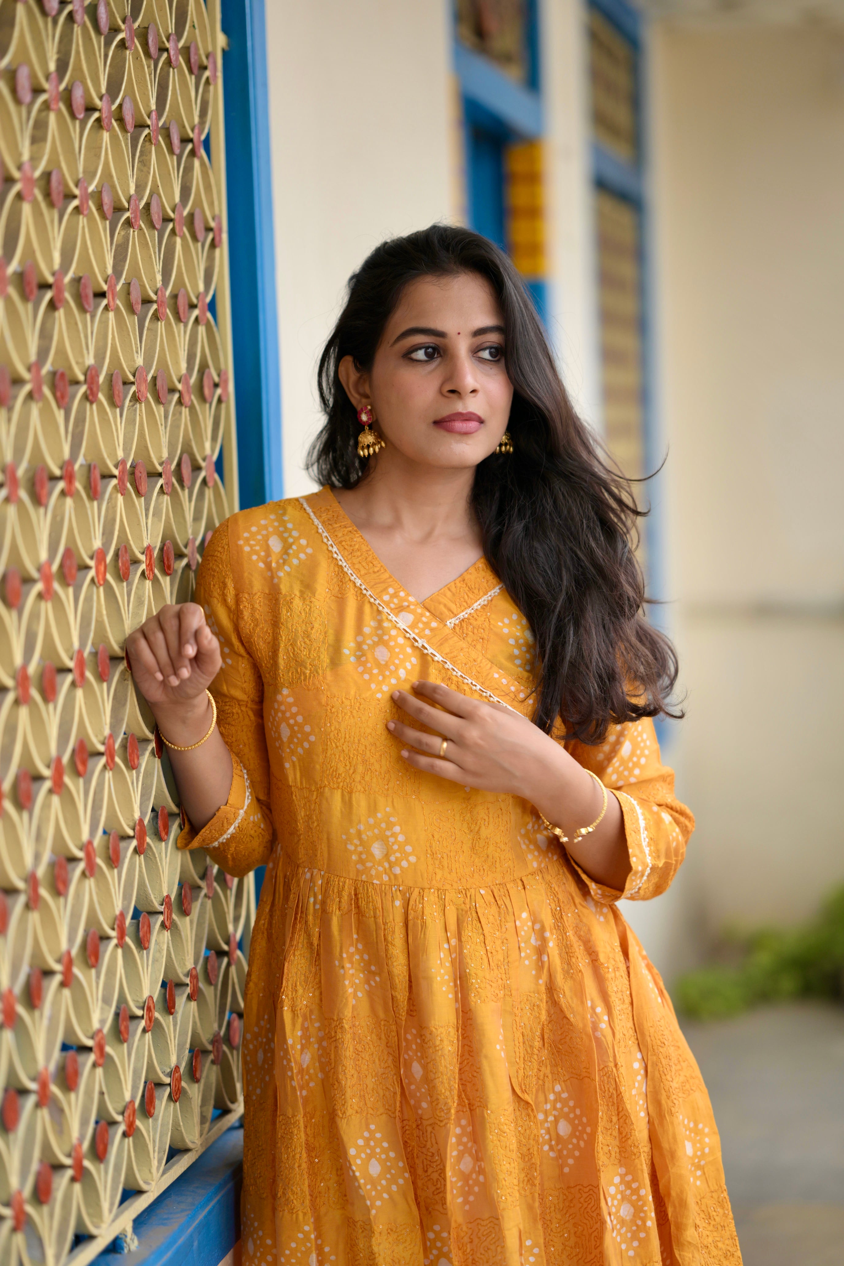 Samyuktha - muslin silk gown with hand embroidery in golden yellow