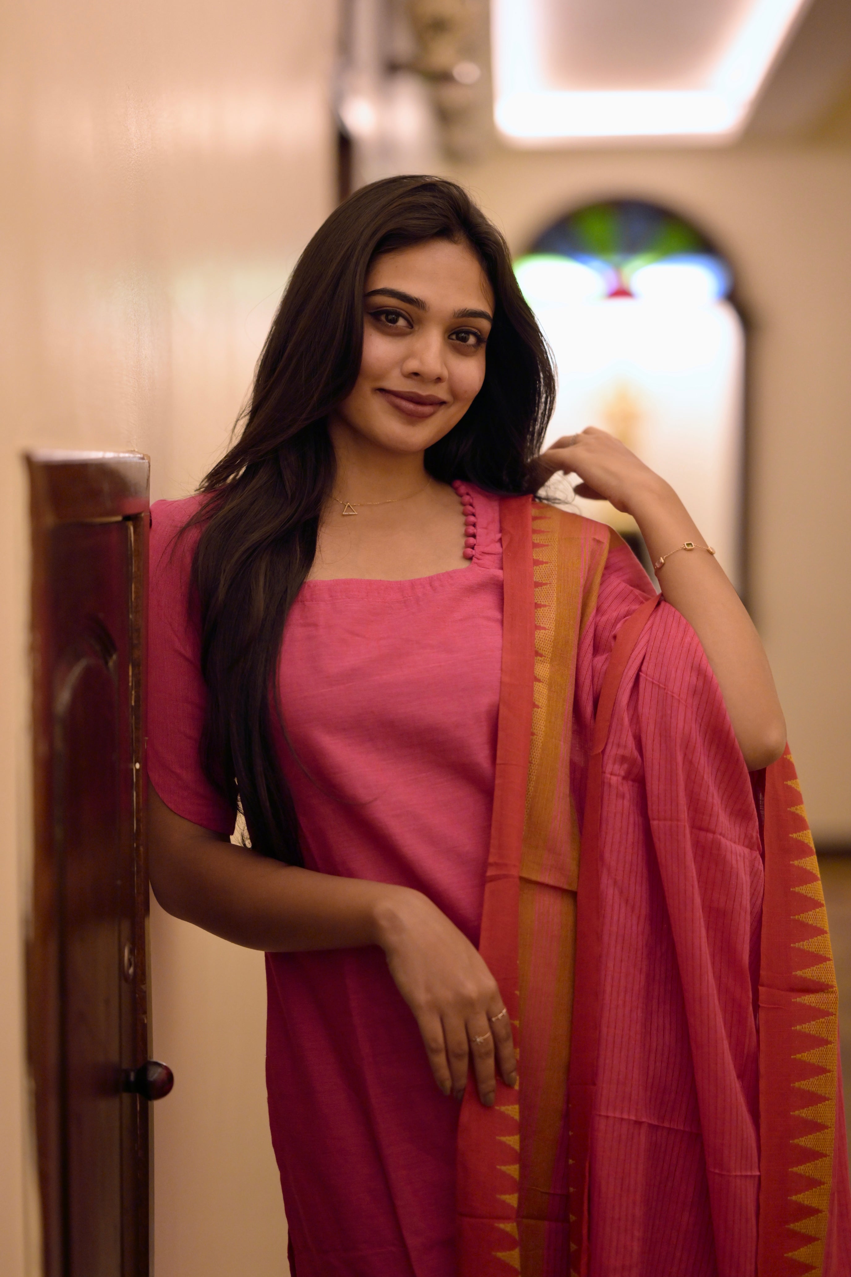 Rithisha ( rani pink) - handloom cotton suit set with temple border in pink colour