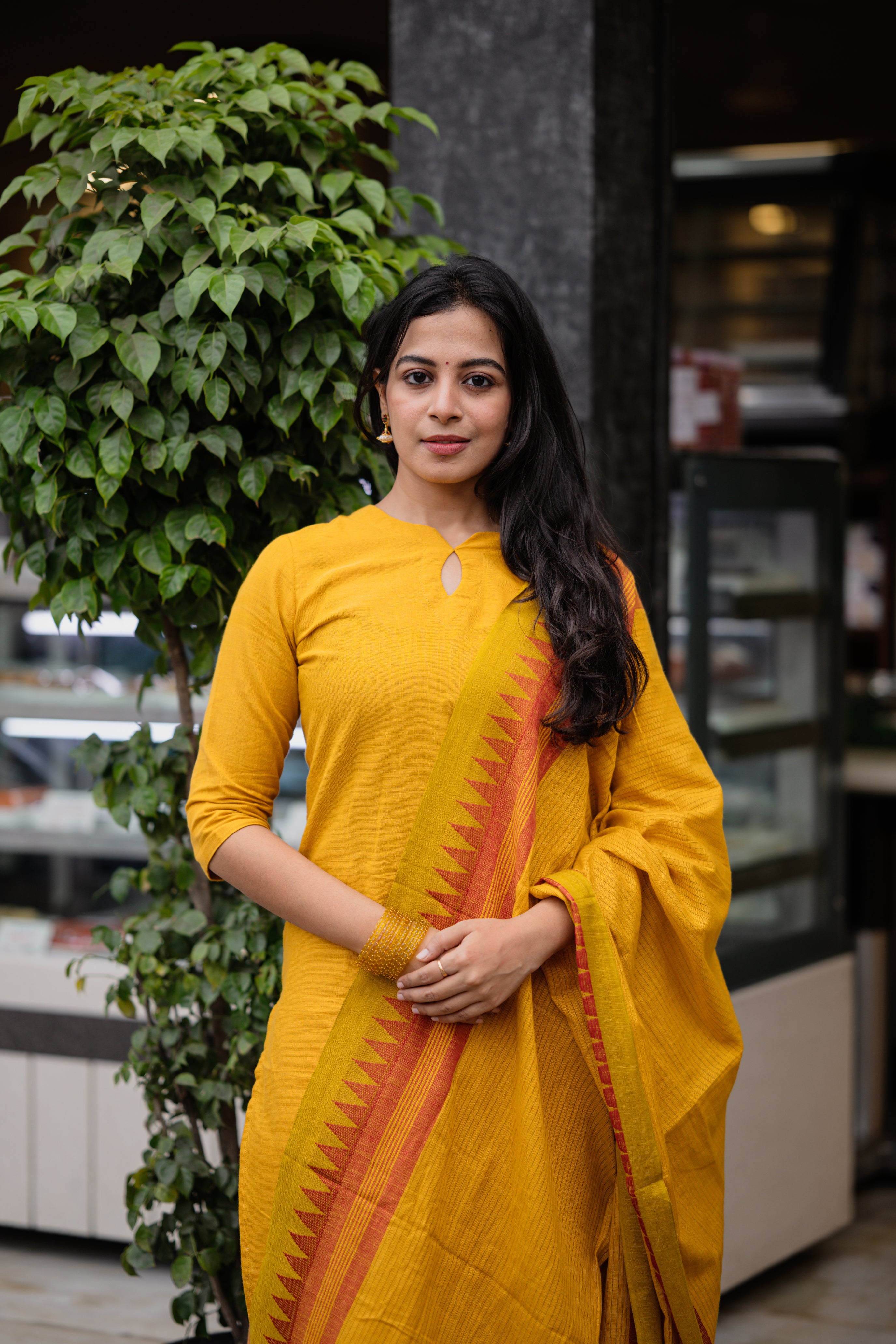 Rithisha - handloom cotton suit set with temple border in yellow colour