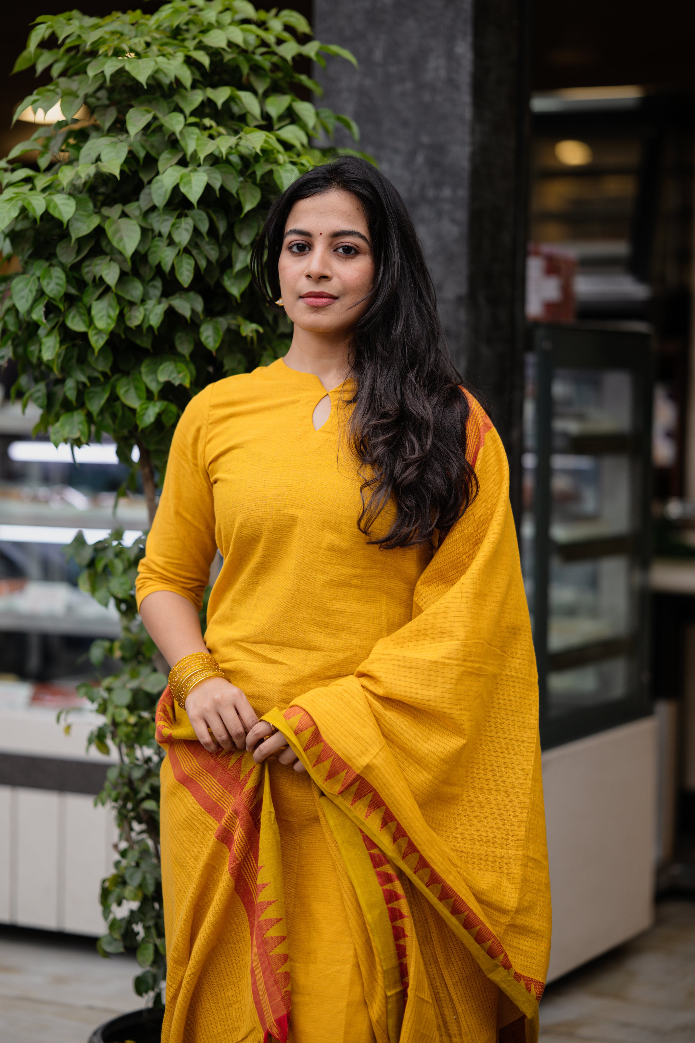 Rithisha - handloom cotton suit set with temple border in yellow colour