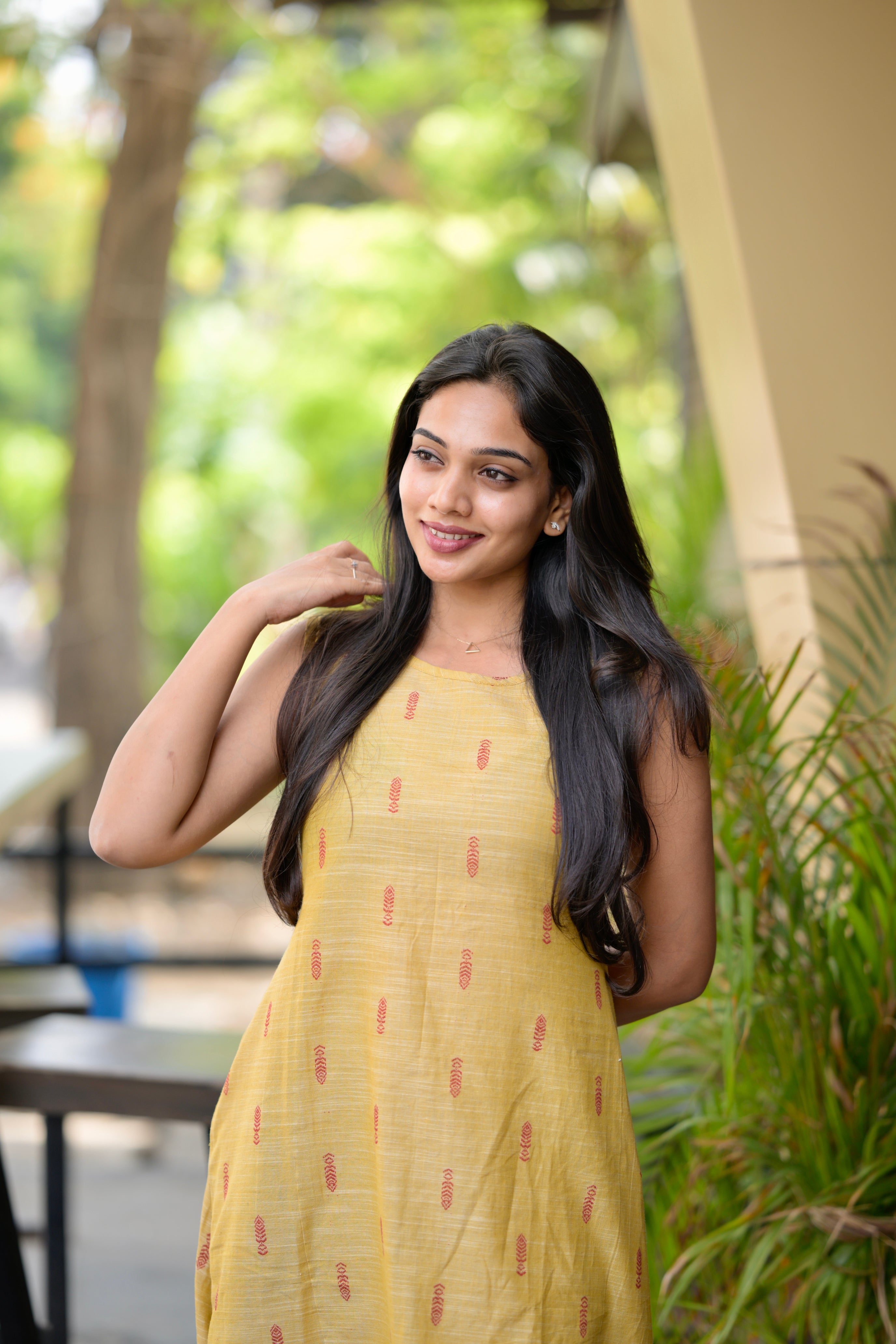 Inaya - yellow handloom linen kurta set with red heart tassels