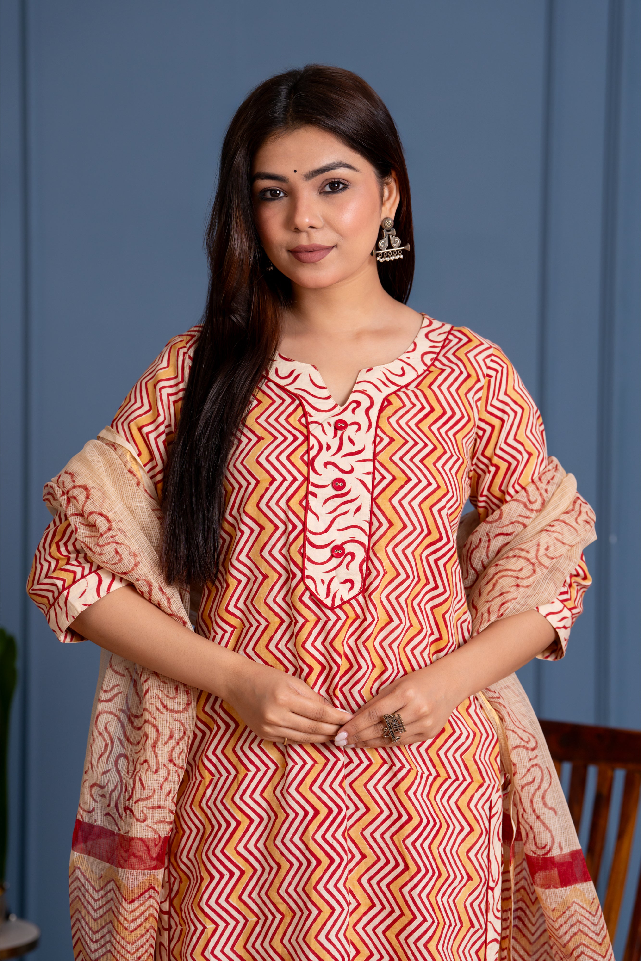 Yuvathi - chevron hand block printed cotton suit set in maroon and white.