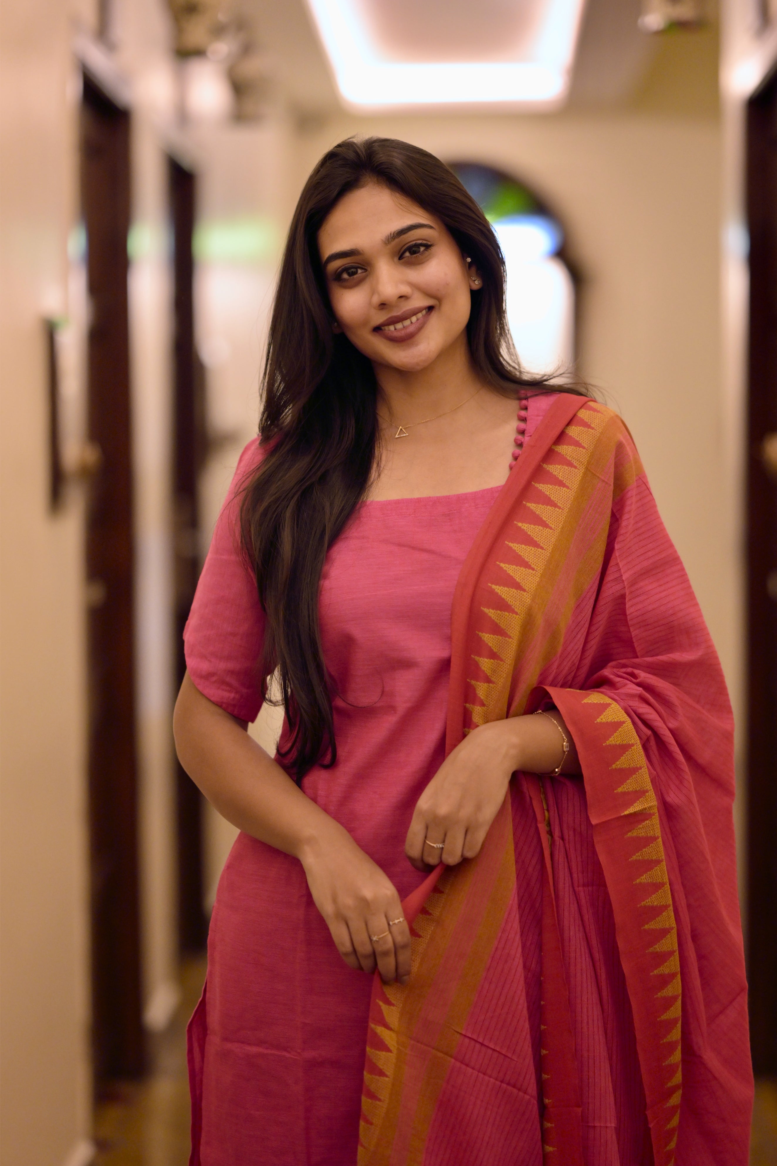 Rithisha ( rani pink) - handloom cotton suit set with temple border in pink colour