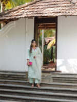 Gauri - modal satin silk kurta set with netted dupatta with hand work in pastel green