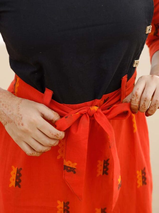 Fanta orange handloom dress - Handloom cotton with thread motifs dress along with belt in fanta orange