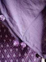 Nardana  -  ikkat cotton suit set in purple with kota doria dupatta with Ikkat potli tassels
